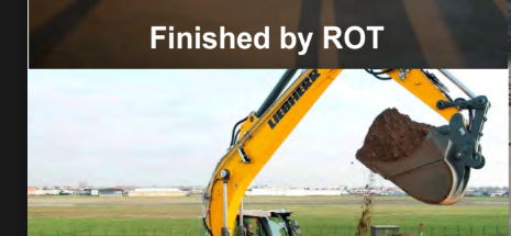 Excavator performing earth work for road construction