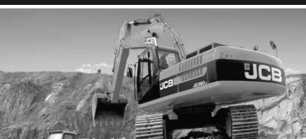 JCB excavator on an industrial construction site during base preparation